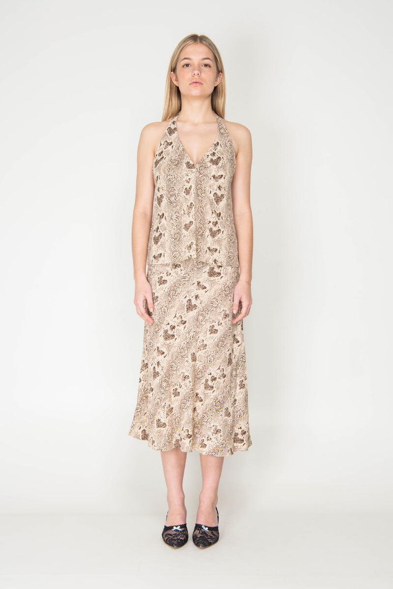 Woman wearing a floral dress on a white background