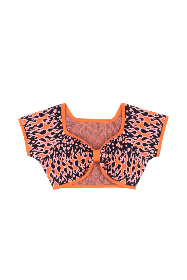Flame print top with orange trim on a white background