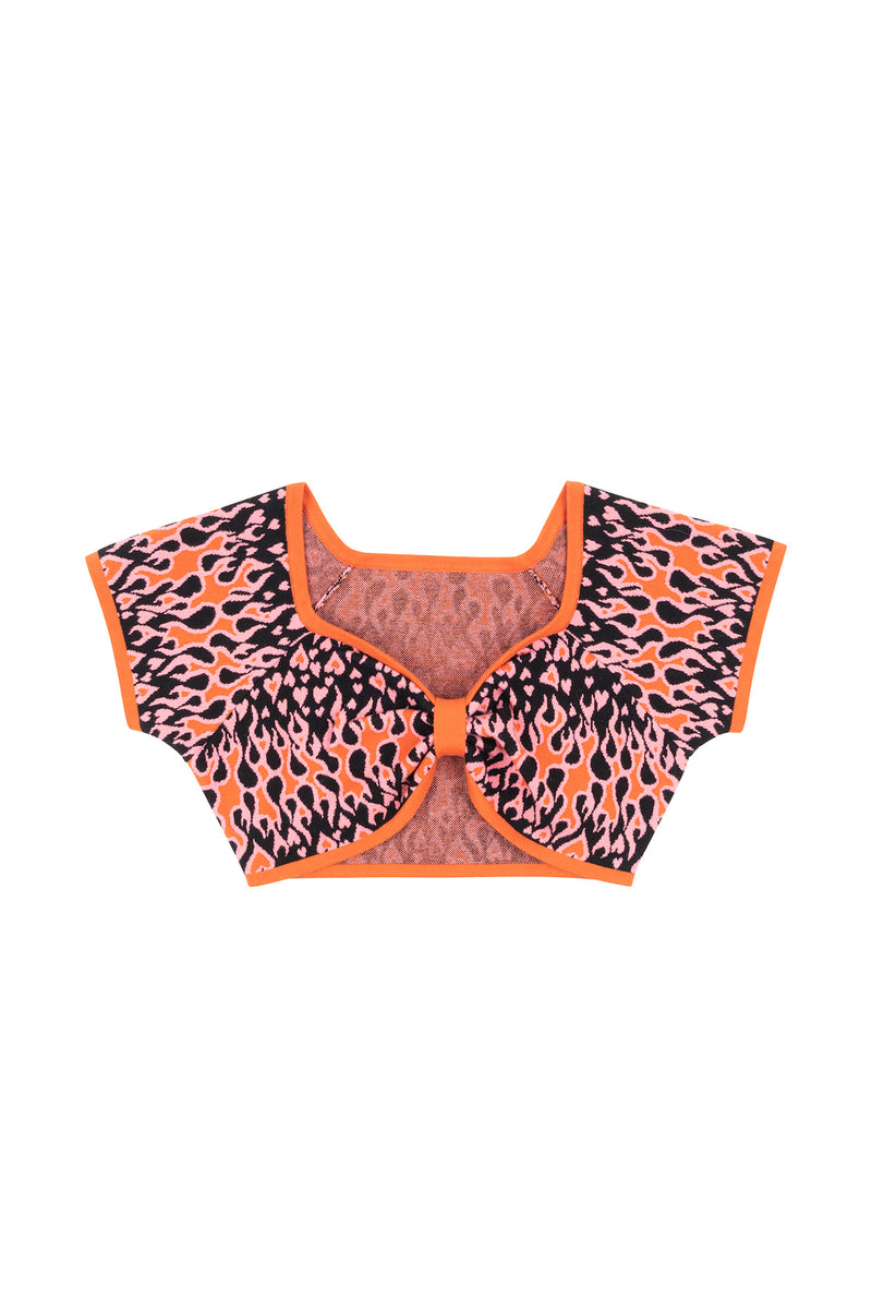 Flame print top with orange trim on a white background