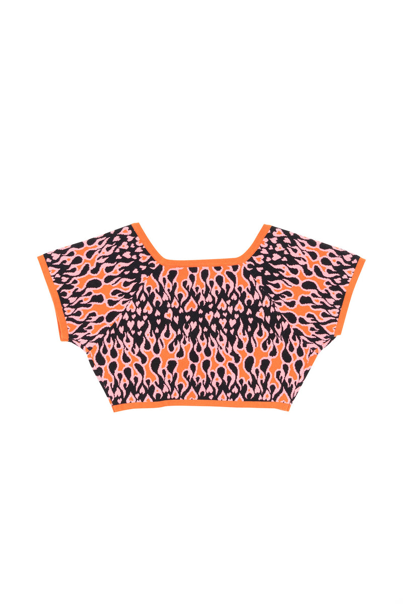 Orange and black flame patterned crop top on a white background