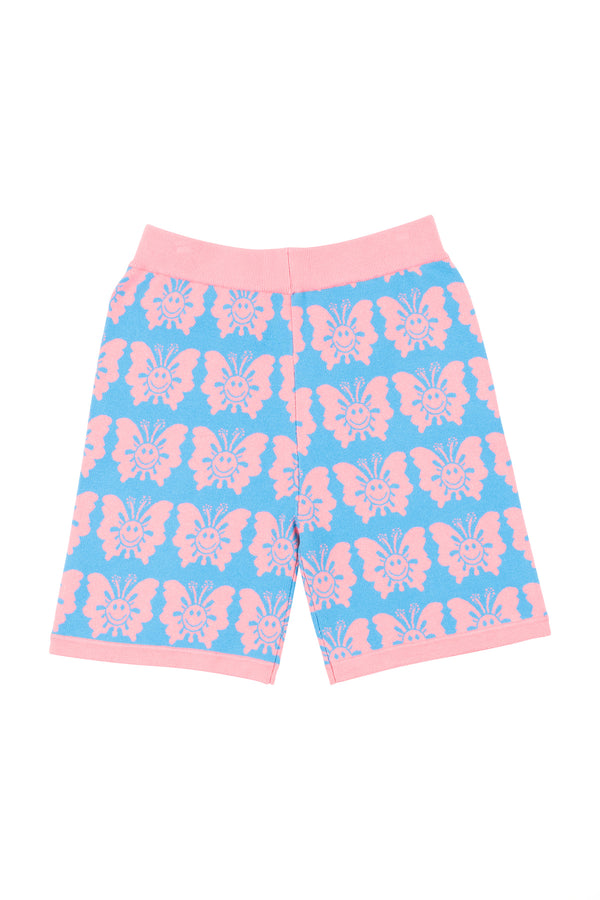 Shorts with pink butterfly pattern on a blue background