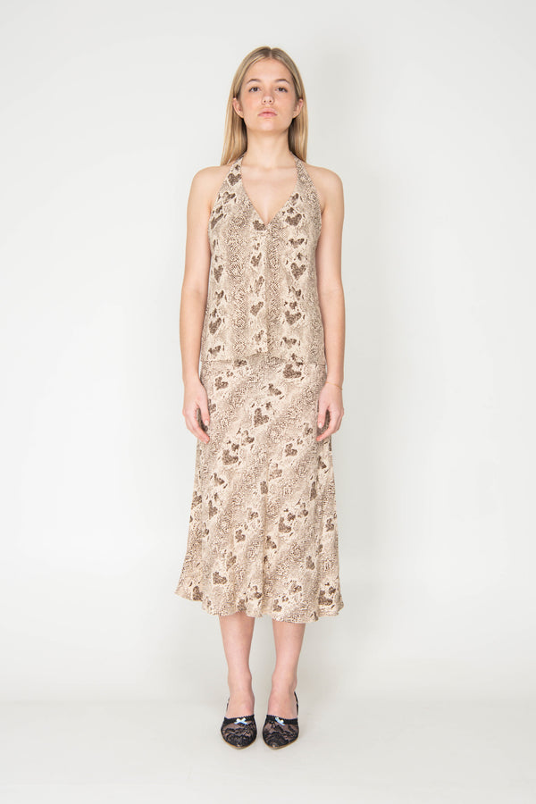 Woman wearing a floral dress on a white background