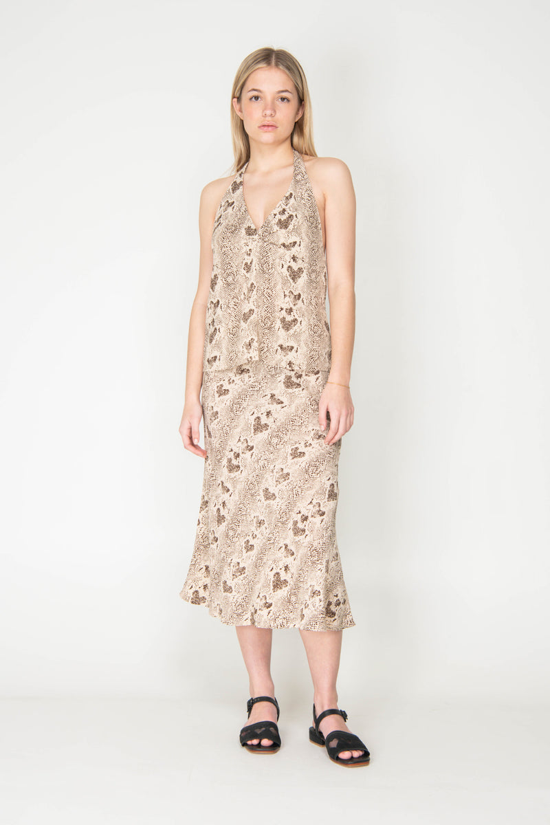 Woman wearing a floral dress on a white background