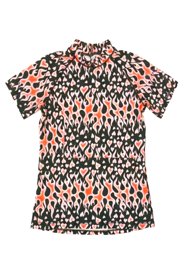 Short-sleeve dress with a colorful abstract pattern on a white background