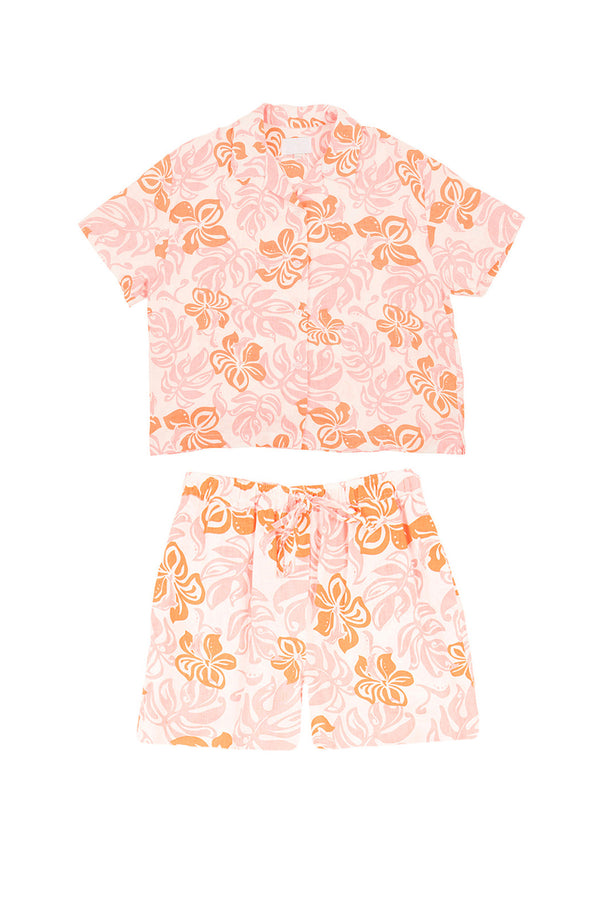 Floral pajama set with pink and orange pattern on a white background