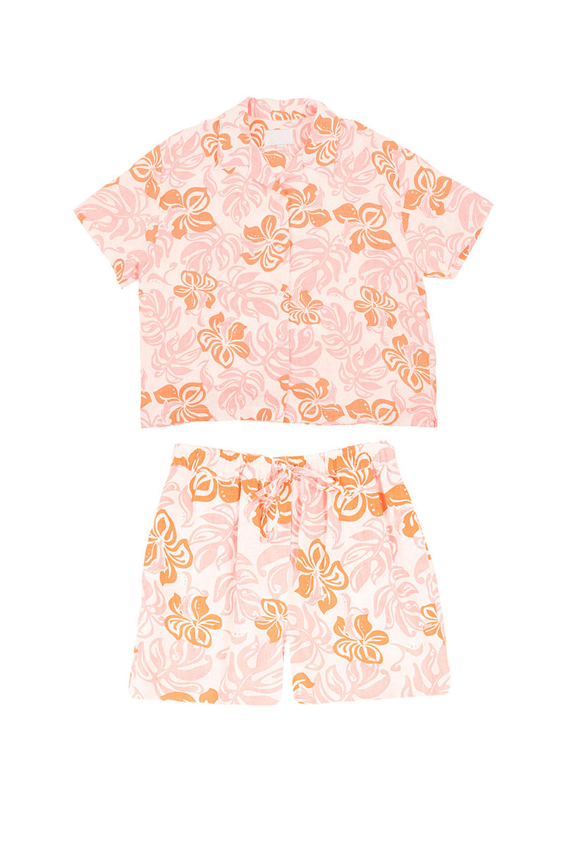 Floral pajama set with pink and orange pattern on a white background