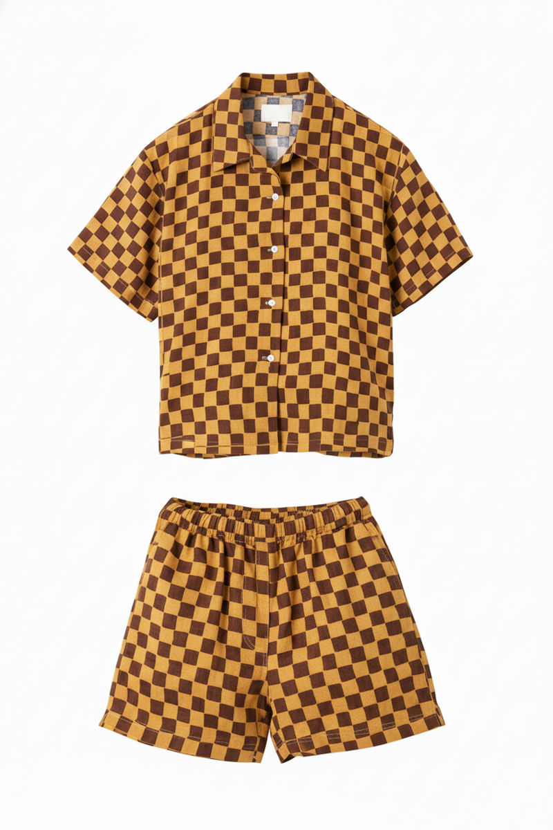 Checkered shirt and shorts set on a white background