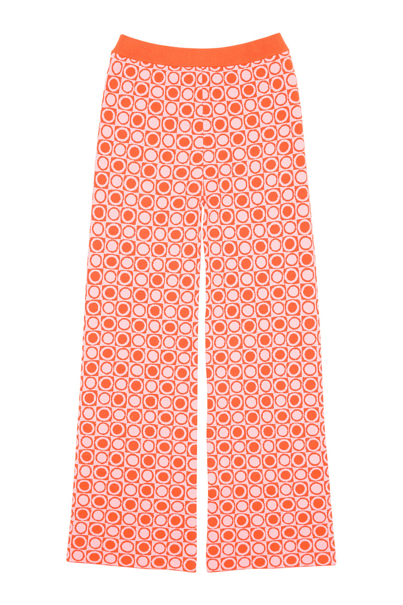 Orange pants with a circular pattern on a white background