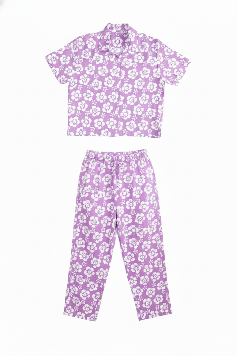 Purple floral pajama set on a white background