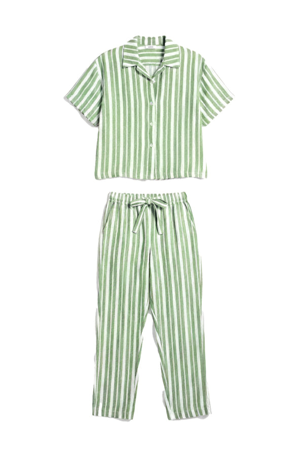 Green and white striped pajama set on a white background