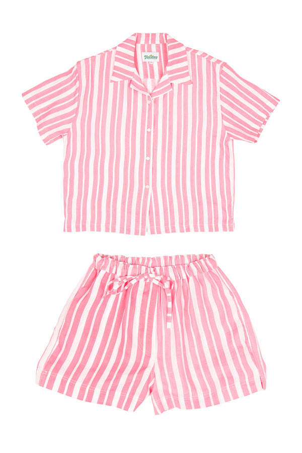 Pink and white striped pajama set on a white background